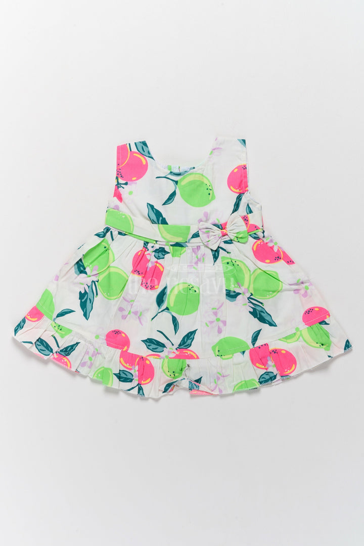 The Nesavu Baby Cotton Frocks Baby Cotton Frock with Vibrant Fruit Print and Bow Accent Nesavu 14 (6M) / White BFJ695A-14 Nesavu Baby Cotton Frock Vibrant Fruit Print Playful Bow Accent