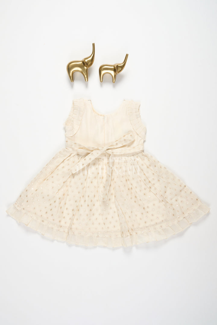 The Nesavu Girls Cotton Frock Baby Fancy Frock in Cream with Golden Accents and Ruffled Sleeves Nesavu Nesavu Baby Fancy Frock Cream Golden Butterfly Motif Ruffled Hem