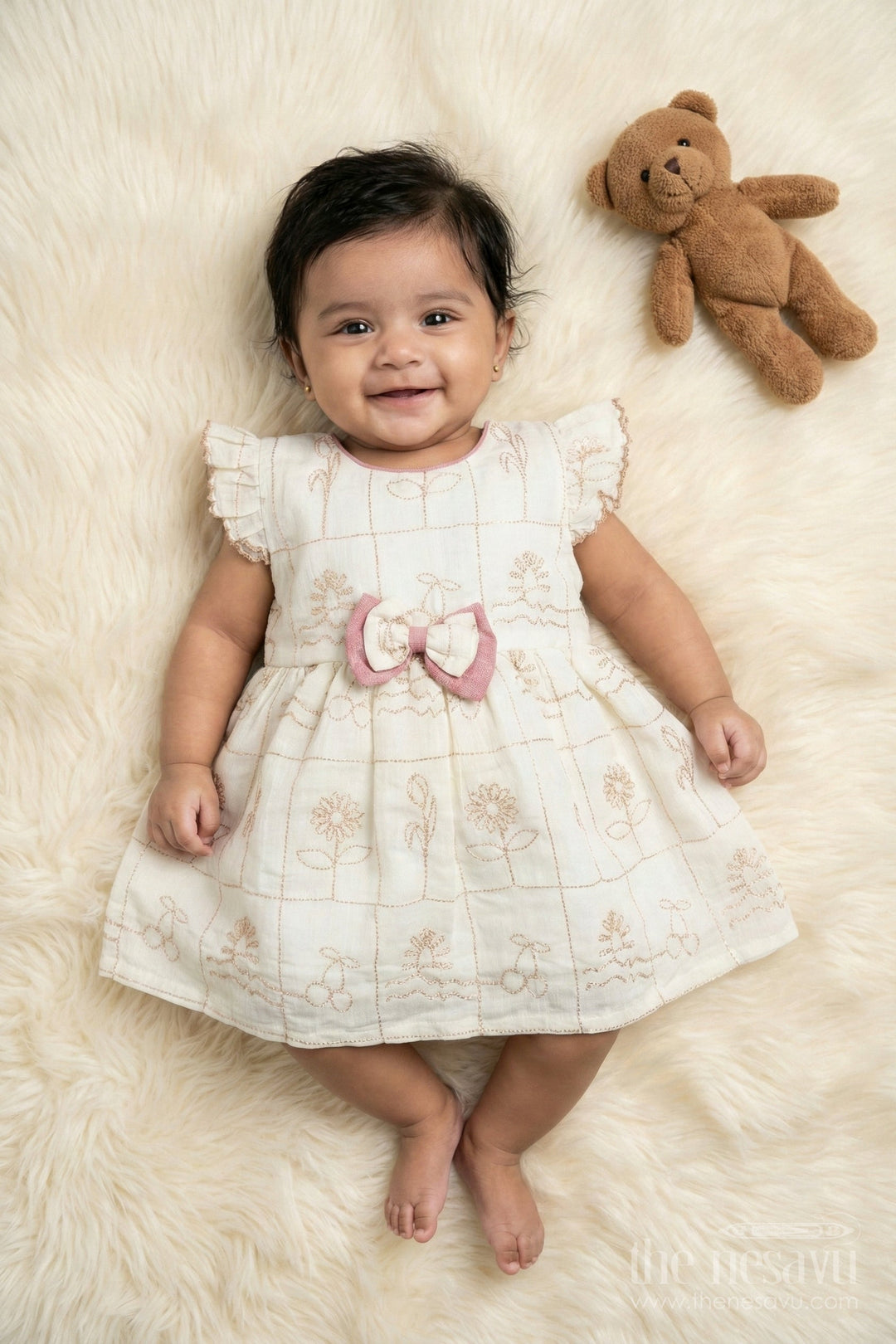 The Nesavu Baby Cotton Frocks Baby Girl Cotton Frock with Bow and Floral Embroidery for Special Moments Nesavu 14 (6M) / Cream / Cotton Blend BFJ911B-14 Nesavu embroidered cotton frock for baby girls with bow detail and festive-ready design