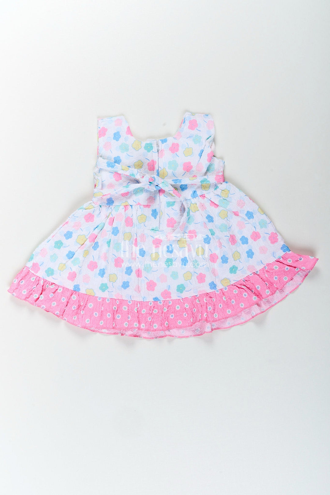 The Nesavu Baby Cotton Frocks Baby girl cotton frock with bow and floral print for casual summer days Nesavu Nesavu baby girl cotton frock pink bow floral print  perfect summer playdates daily wear