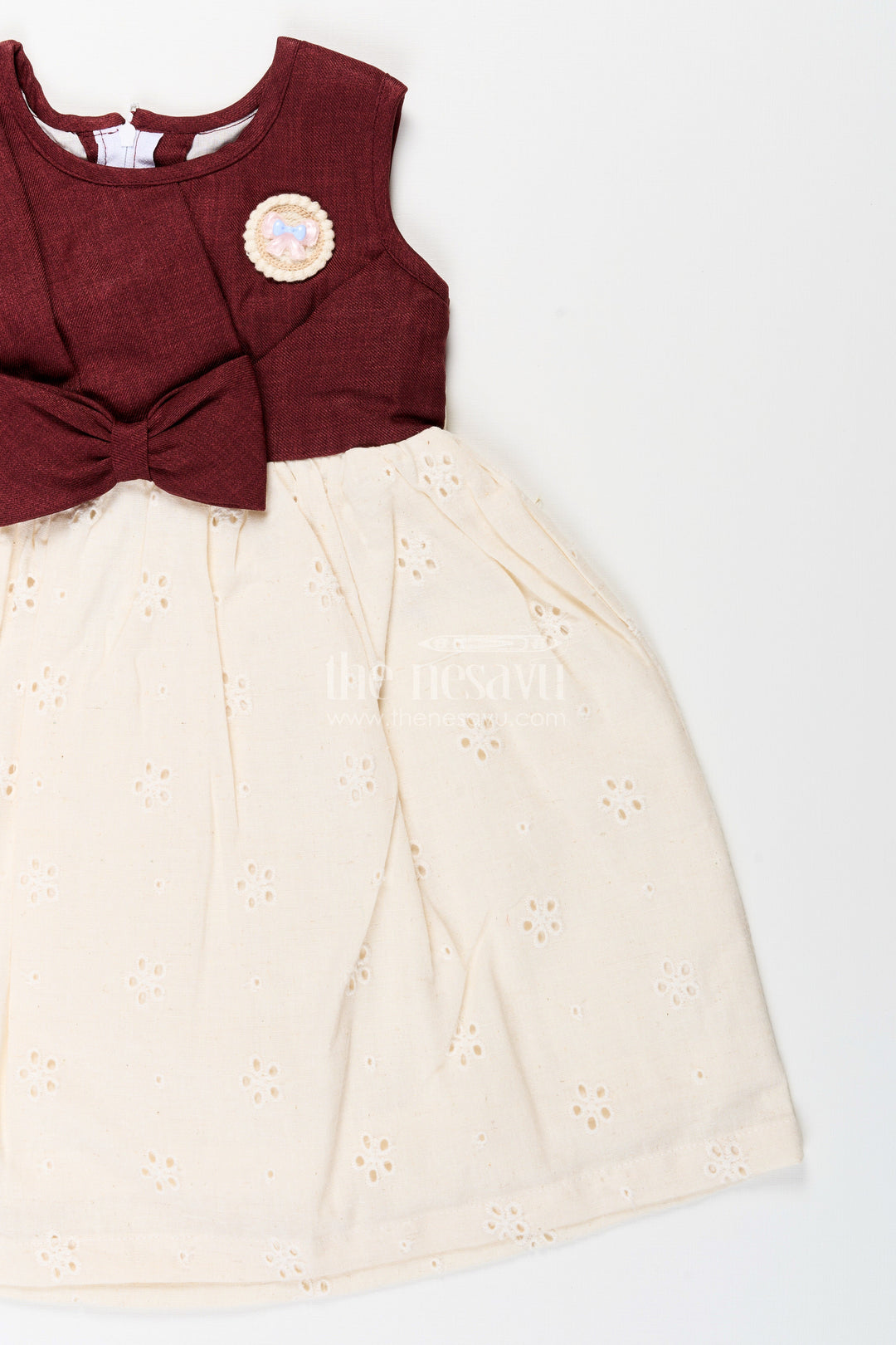 The Nesavu Girls Cotton Frock Baby Girl Hakoba Cotton Frock with Maroon Yoke for Festive and Casual Wear Nesavu Nesavu baby girl Hakoba cotton frock maroon yoke bow detail festive wear
