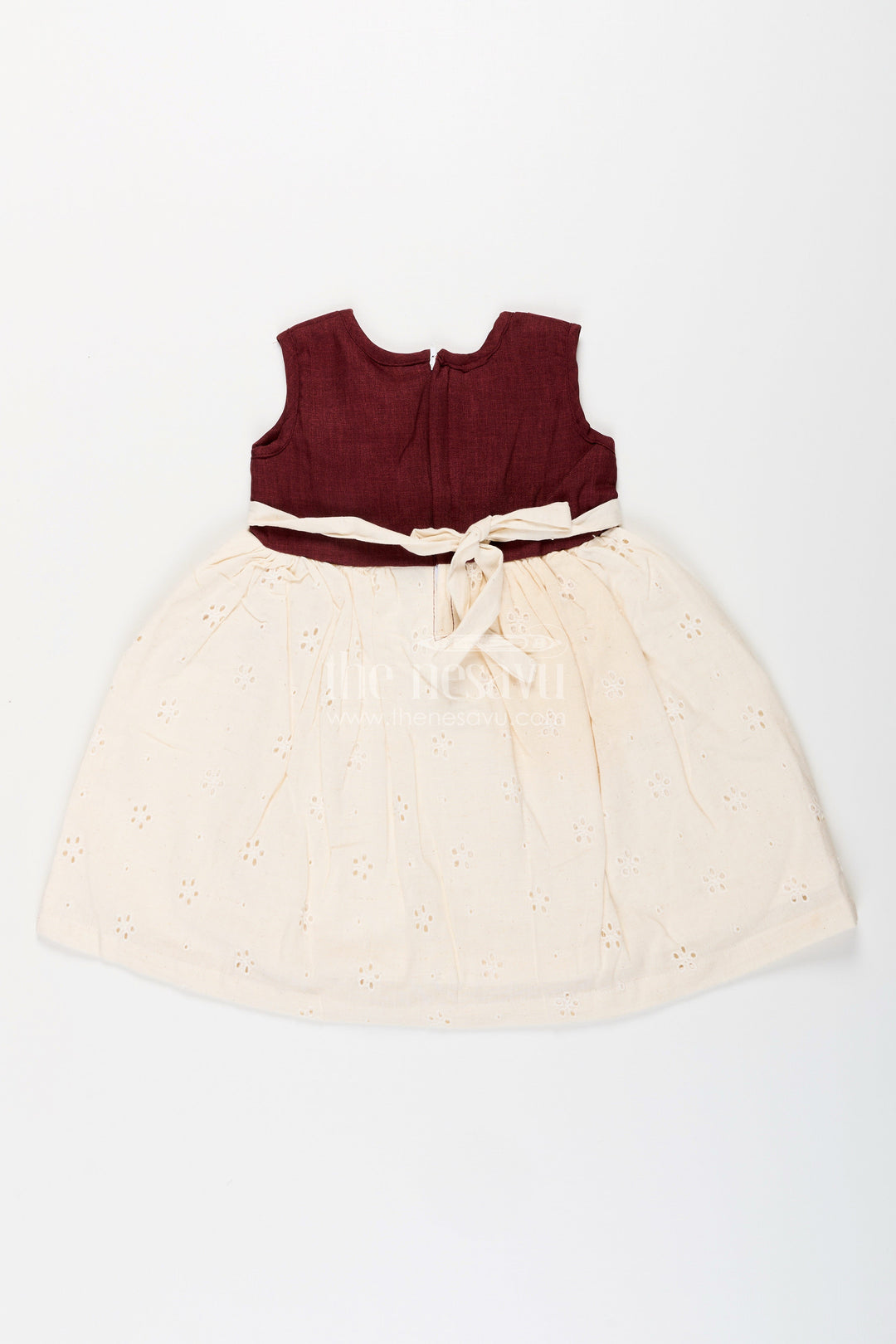 The Nesavu Girls Cotton Frock Baby Girl Hakoba Cotton Frock with Maroon Yoke for Festive and Casual Wear Nesavu Nesavu baby girl Hakoba cotton frock maroon yoke bow detail festive wear