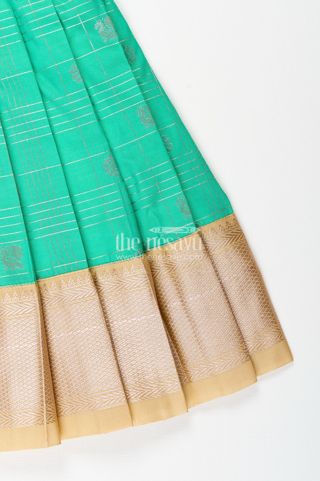 The Nesavu Girls Kanchi Silk Frock Baby Girl Kanchipuram Silk Frock for Festive and Traditional Celebrations Nesavu Nesavu baby girl kanchipuram silk frock in green and gold for weddings and festive wear