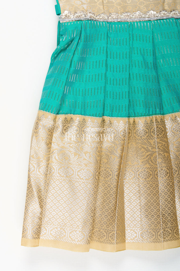The Nesavu Girls Kanchi Silk Frock Baby Girl Kanchipuram Silk Frock for Weddings and Festive Occasions Nesavu Nesavu baby girl kanchipuram silk frock in green and gold with lace detail for festive celebrations