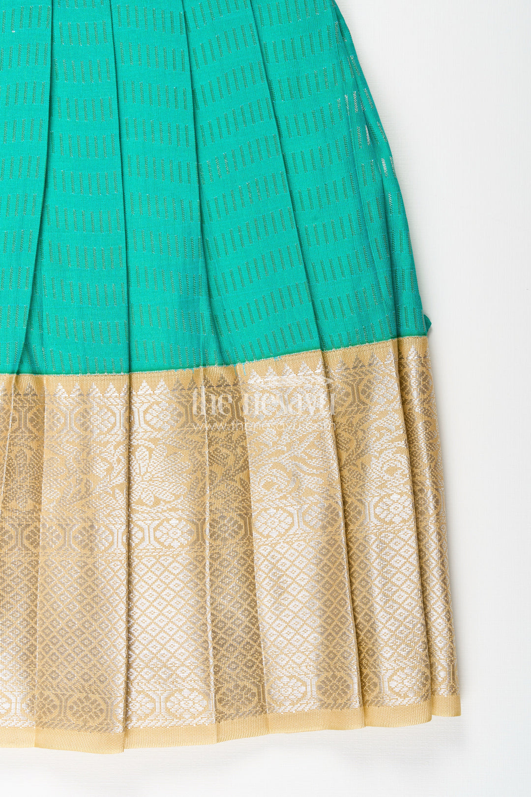 The Nesavu Girls Kanchi Silk Frock Baby Girl Kanchipuram Silk Frock for Weddings and Festive Occasions Nesavu Nesavu baby girl kanchipuram silk frock in green and gold with lace detail for festive celebrations