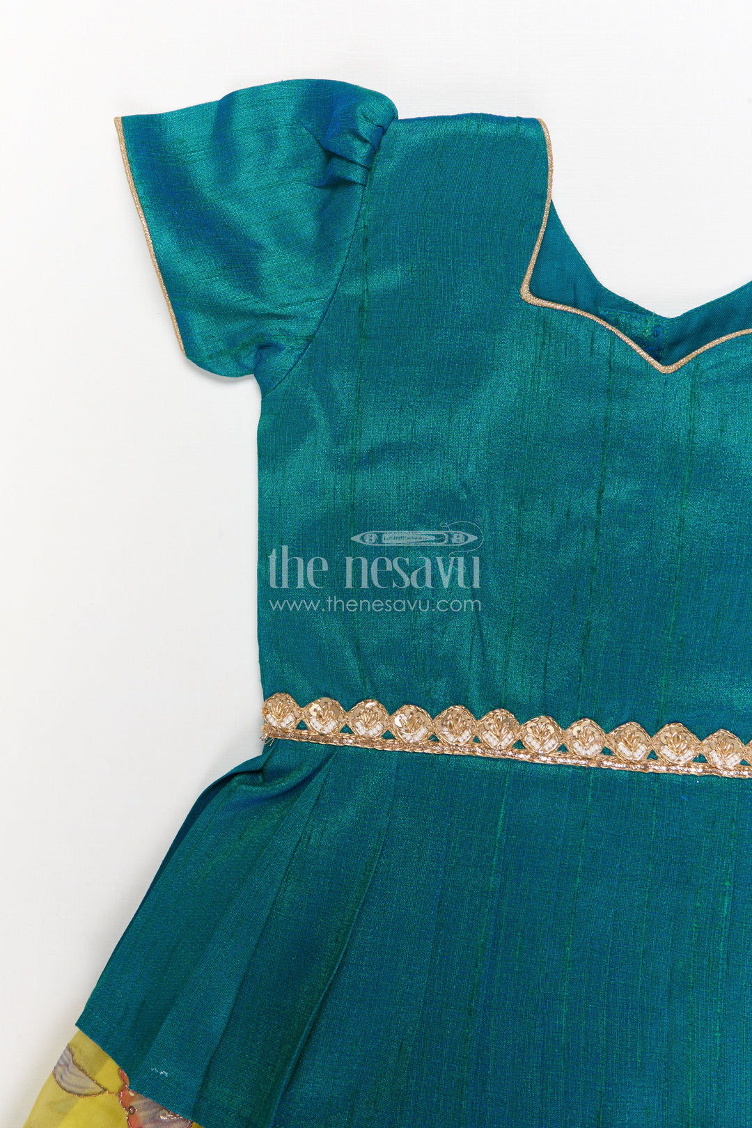 The Nesavu Pattu Pavadai Baby Girl Pattu Pavadai Set for Festivals and Wedding Ceremonies Nesavu Nesavu baby girl pattu pavadai with zari embroidered skirt and raw silk blouse for traditional events