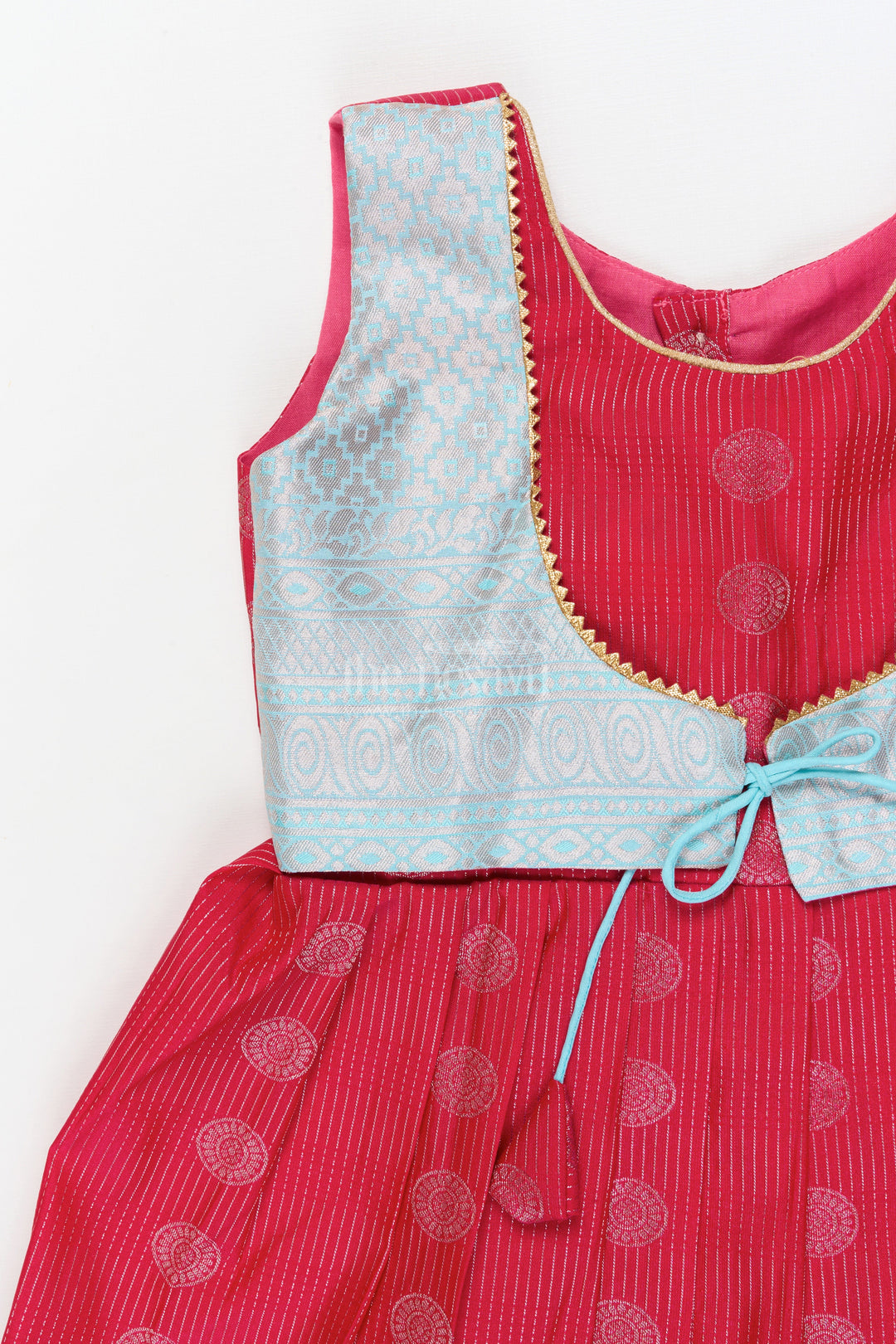 The Nesavu Girls Kanchi Silk Frock Baby Girl Silk Frock for Cultural Events and Festive Photo Moments Nesavu Nesavu baby girl silk frock with zari border and tie-up overlay for festive family occasions