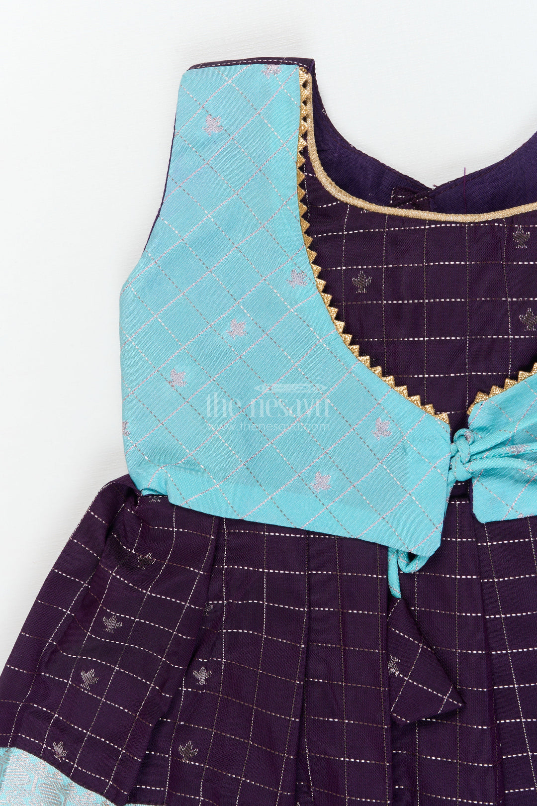 The Nesavu Girls Kanchi Silk Frock Baby Girl Silk Frock for Naming Ceremony and Festive Milestones Nesavu Nesavu baby girl silk frock for naming ceremony with zari checks and traditional border