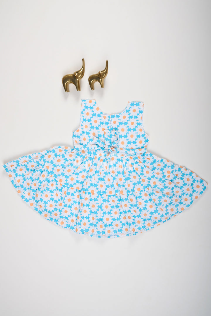 The Nesavu Baby Cotton Frocks Baby Girls Blue Daisy Print Sleeveless Cotton Frock with Flared Skirt and Lico Patch Nesavu Nesavu Baby Girls Blue Daisy Floral Cotton Frock Flared Skirt Fun Lico Patch