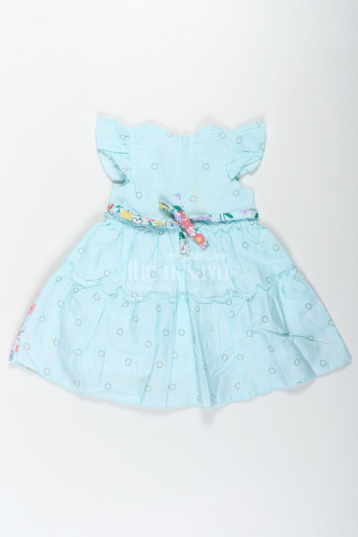 The Nesavu Baby Cotton Frocks Baby Girls Cotton Eid Frock with Pastel Green Tone and Bright Floral Border for Festive Comfort Nesavu Baby Girls Eid Frock Cotton Colorful Floral Border Festive Green Hue | The Nesavu
