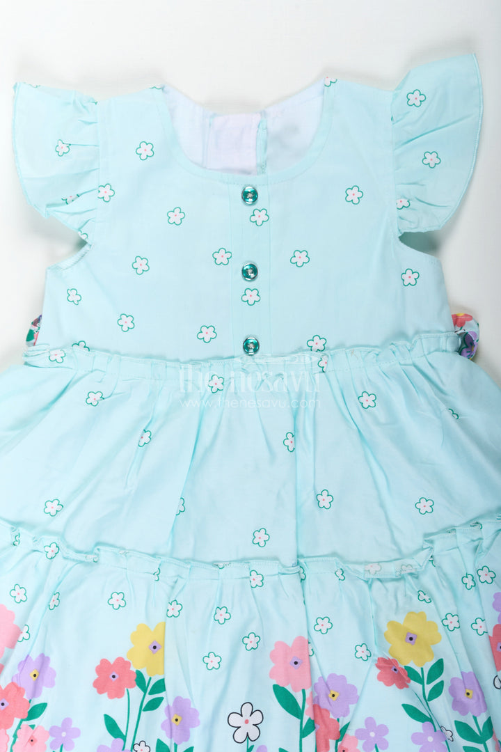 The Nesavu Baby Cotton Frocks Baby Girls Cotton Eid Frock with Pastel Green Tone and Bright Floral Border for Festive Comfort Nesavu Baby Girls Eid Frock Cotton Colorful Floral Border Festive Green Hue | The Nesavu