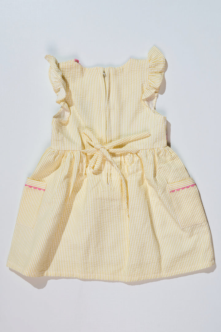 The Nesavu Baby Cotton Frocks Baby Girls Cotton Yellow Frock in Seer Sucker Fabric with Embroidery and Pockets Nesavu Baby Girls Cotton Yellow Frock Seer Sucker Fabric Embroidery Pockets | The Nesavu