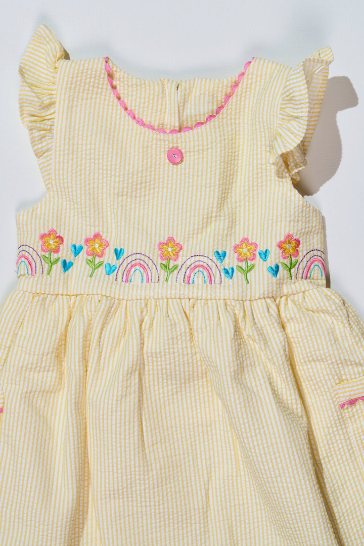The Nesavu Baby Cotton Frocks Baby Girls Cotton Yellow Frock in Seer Sucker Fabric with Embroidery and Pockets Nesavu Baby Girls Cotton Yellow Frock Seer Sucker Fabric Embroidery Pockets | The Nesavu