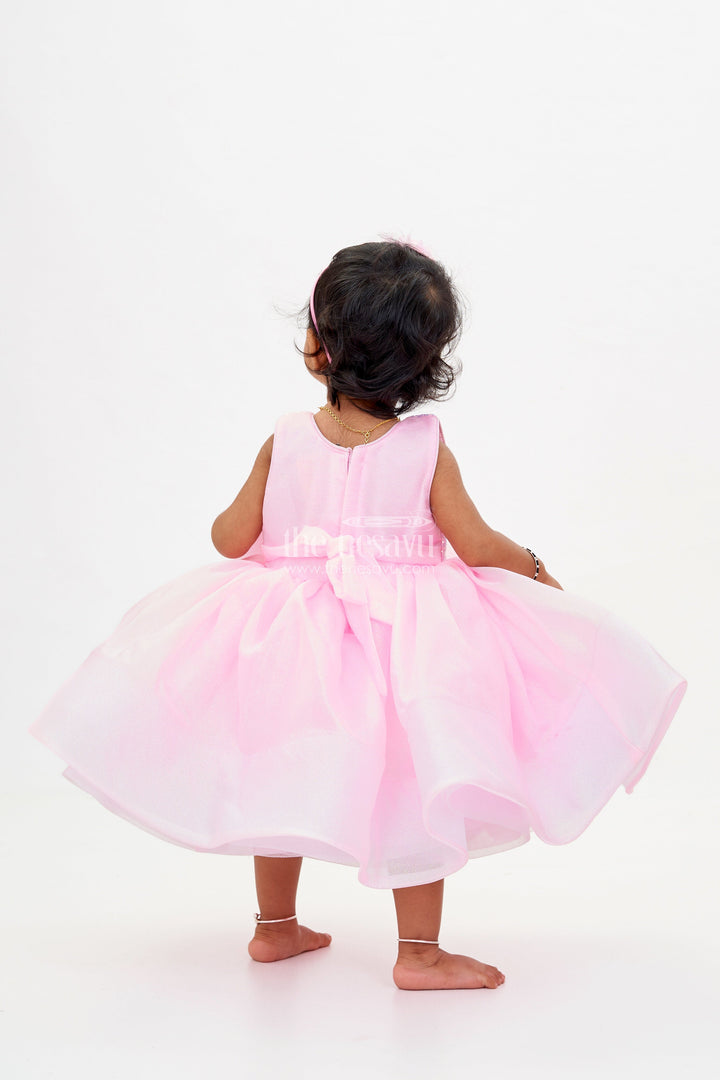 The Nesavu Baby Fancy Frock Baby Girls Fancy Frock in Pink Shimmer Fabric with Oversized Bow and Flared Silhouette Nesavu Baby Girls Fancy Frock Pink Shimmer Fabric Oversized Bow Flared Skirt | The Nesavu