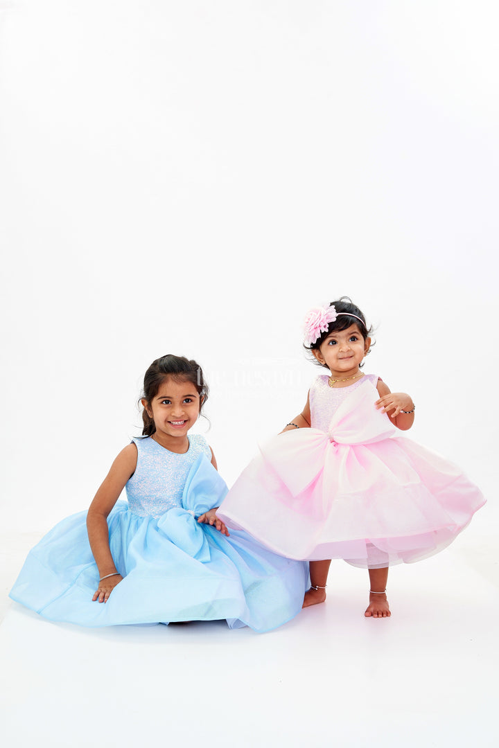 The Nesavu Baby Fancy Frock Baby Girls Fancy Frock in Pink Shimmer Fabric with Oversized Bow and Flared Silhouette Nesavu Baby Girls Fancy Frock Pink Shimmer Fabric Oversized Bow Flared Skirt | The Nesavu