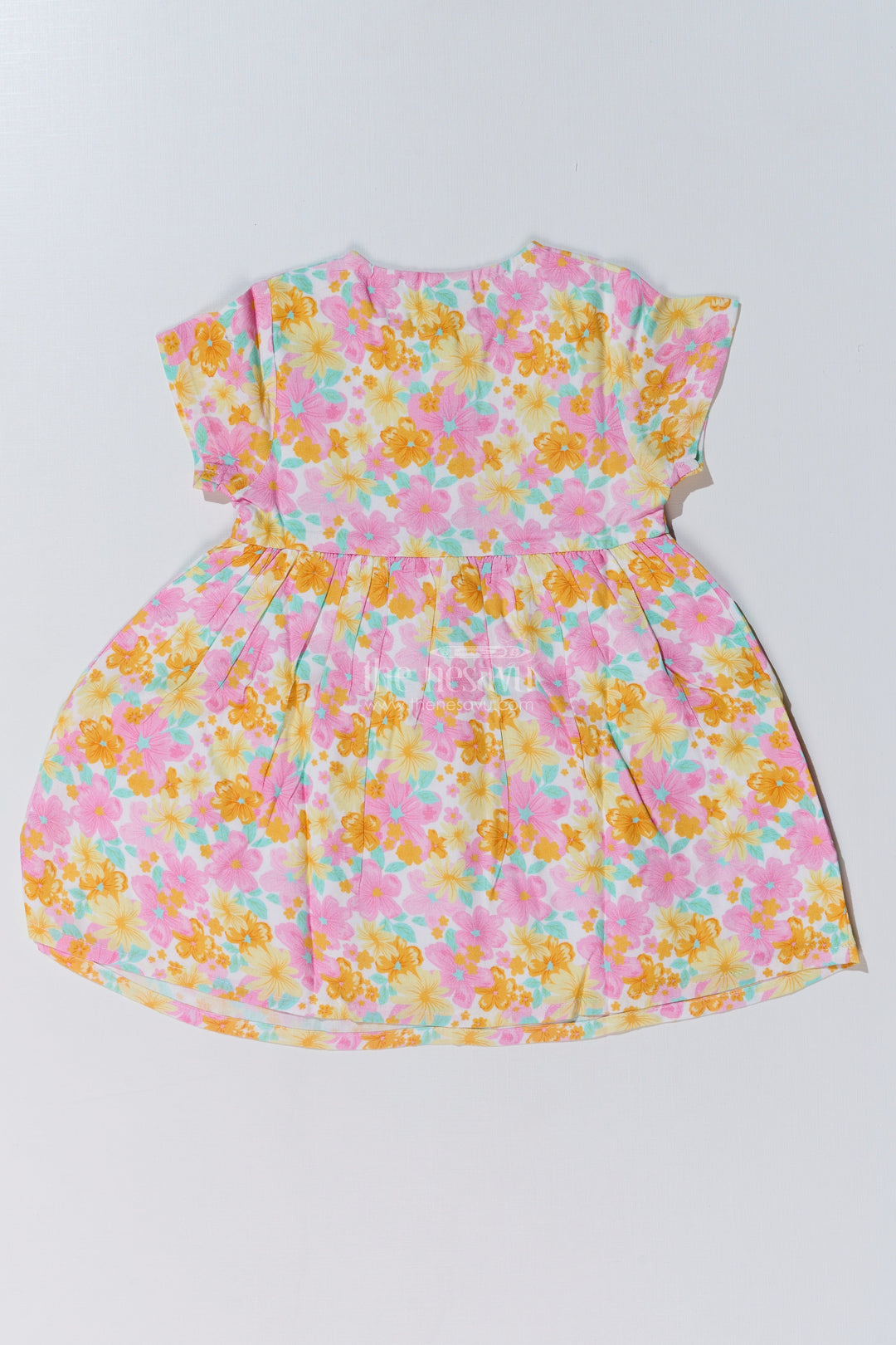 The Nesavu Baby Cotton Frocks Baby Girls Flower Print Frock with Button-Down Front and Side Pockets for a Cute Everyday Look Nesavu Baby Girls Flower Print Frock Button-Down Front Pockets a Cute Look | The Nesavu