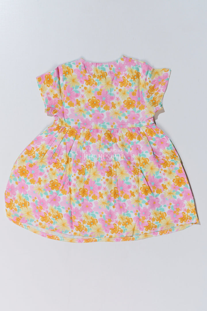The Nesavu Baby Cotton Frocks Baby Girls Flower Print Frock with Button-Down Front and Side Pockets for a Cute Everyday Look Nesavu Baby Girls Flower Print Frock Button-Down Front Pockets a Cute Look | The Nesavu