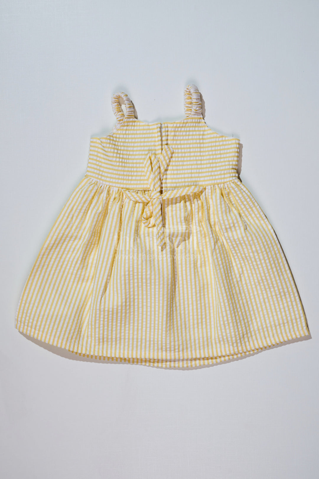 The Nesavu Baby Cotton Frocks Baby Girls Lemon Yellow Dress in Seer Sucker Cotton with Floral Embroidery and Bow Detail Nesavu Baby Girls Lemon Yellow Dress Seer Sucker Cotton Floral Embroidery | The Nesavu