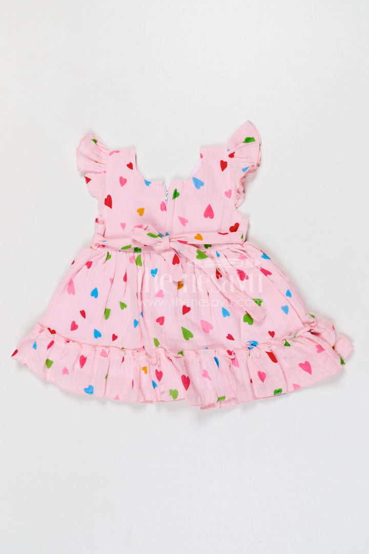 The Nesavu Baby Cotton Frocks Baby Girls Muslin Cotton Heart Print Frock with Bow Detail Nesavu Nesavu baby girls muslin cotton heart printed frock with bow for cute baby fashion