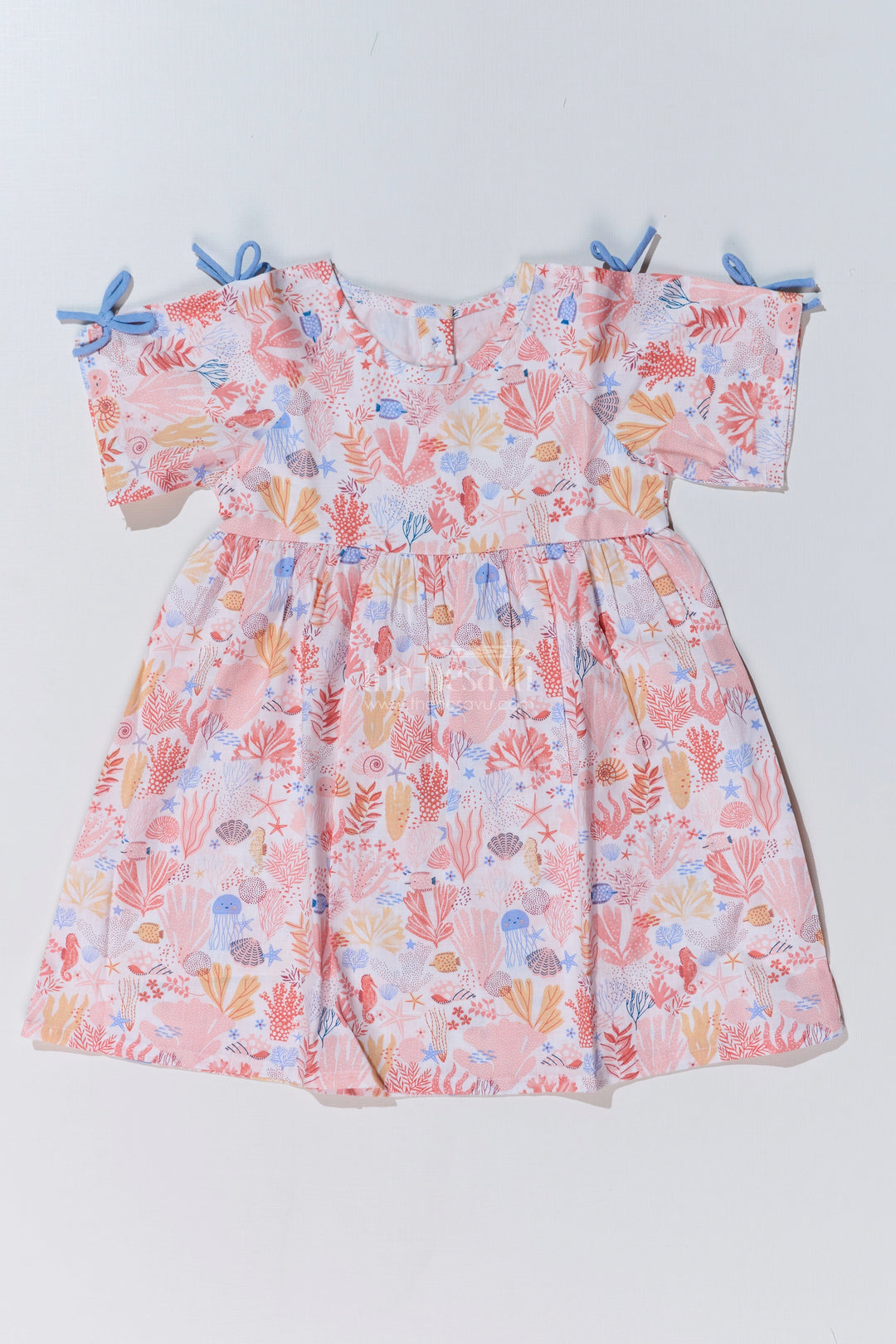 The Nesavu Baby Cotton Frocks Baby Girls Peach Frock with Ocean-Inspired Print and Tie-Up Sleeves for a Charming Look Nesavu 10 (NB) / Peach BFJ735A-10 Baby Girls Peach Frock Ocean Print Tie-Up Sleeves Playful Outfits | The Nesavu