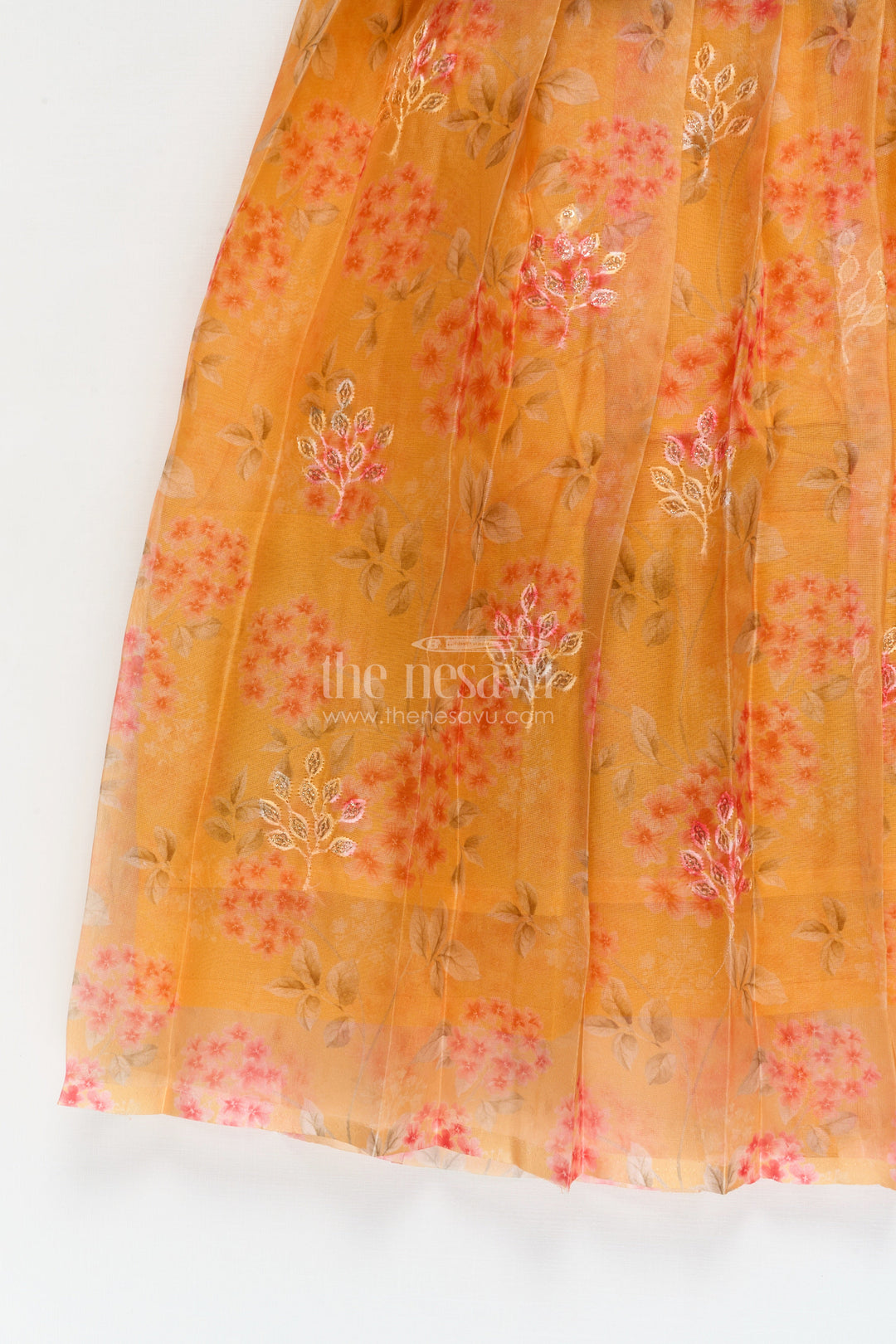 The Nesavu Pattu Pavadai Baby Pattu Pavadai with Floral Skirt for Birthdays and Outdoor Events Nesavu Nesavu floral pattu pavadai for baby girls with raw silk blouse – perfect for birthdays and summer events