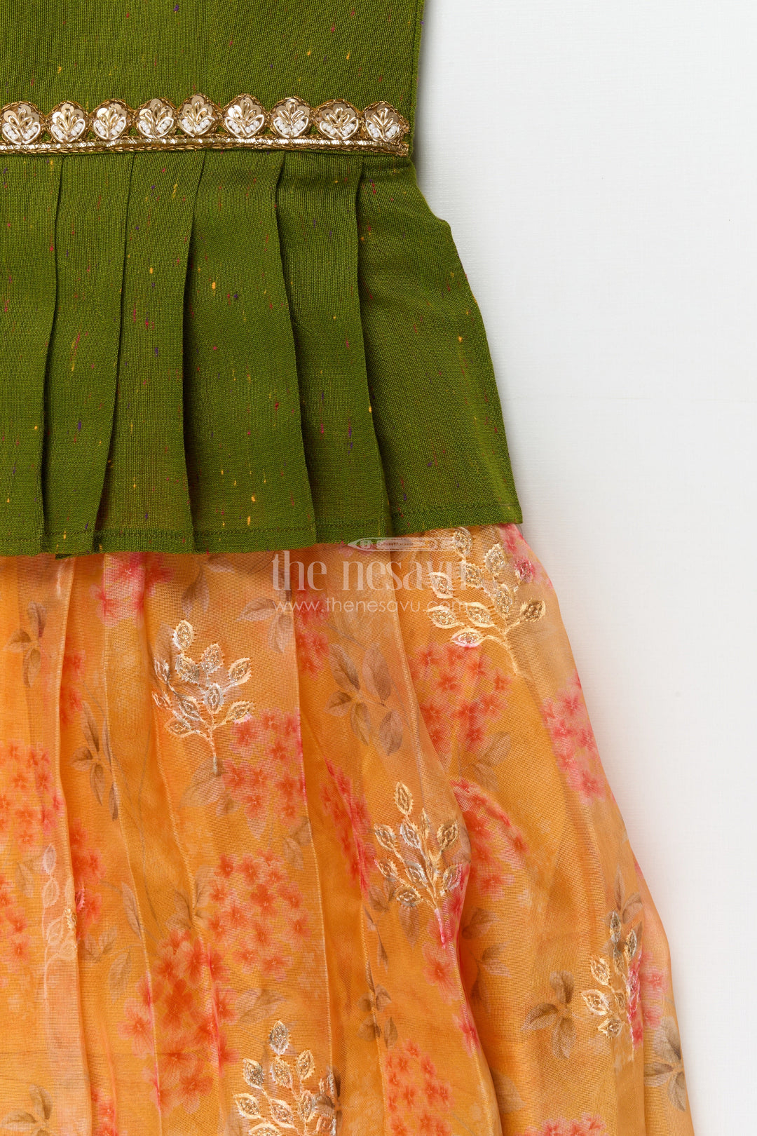 The Nesavu Pattu Pavadai Baby Pattu Pavadai with Floral Skirt for Birthdays and Outdoor Events Nesavu Nesavu floral pattu pavadai for baby girls with raw silk blouse – perfect for birthdays and summer events