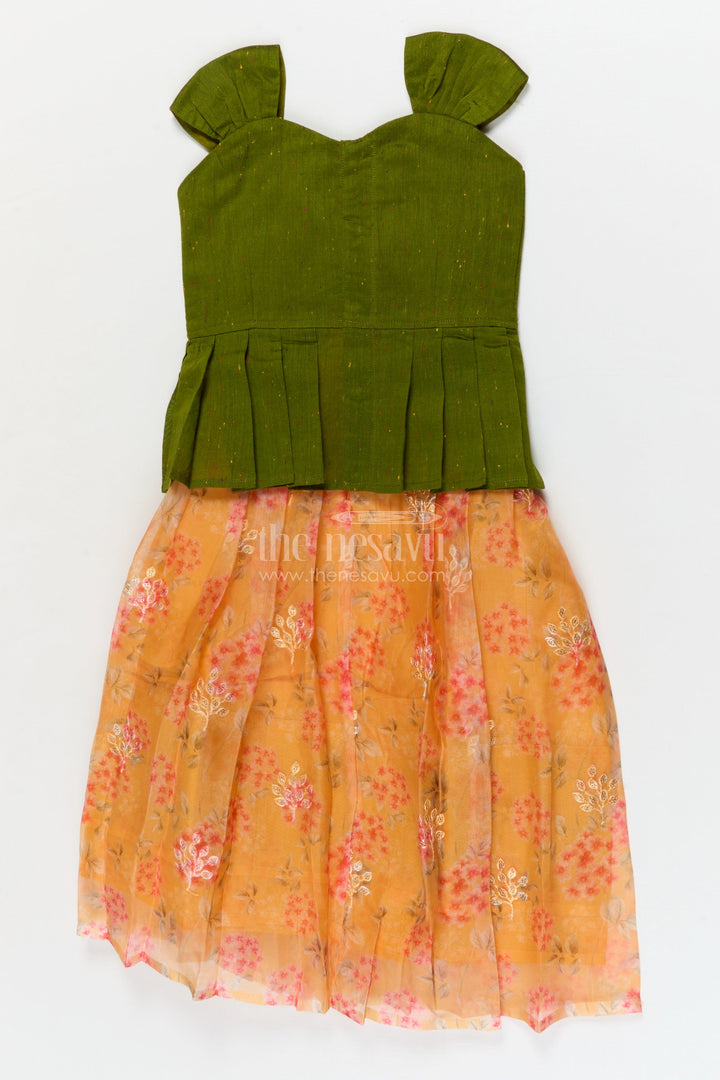 The Nesavu Pattu Pavadai Baby Pattu Pavadai with Floral Skirt for Birthdays and Outdoor Events Nesavu Nesavu floral pattu pavadai for baby girls with raw silk blouse – perfect for birthdays and summer events