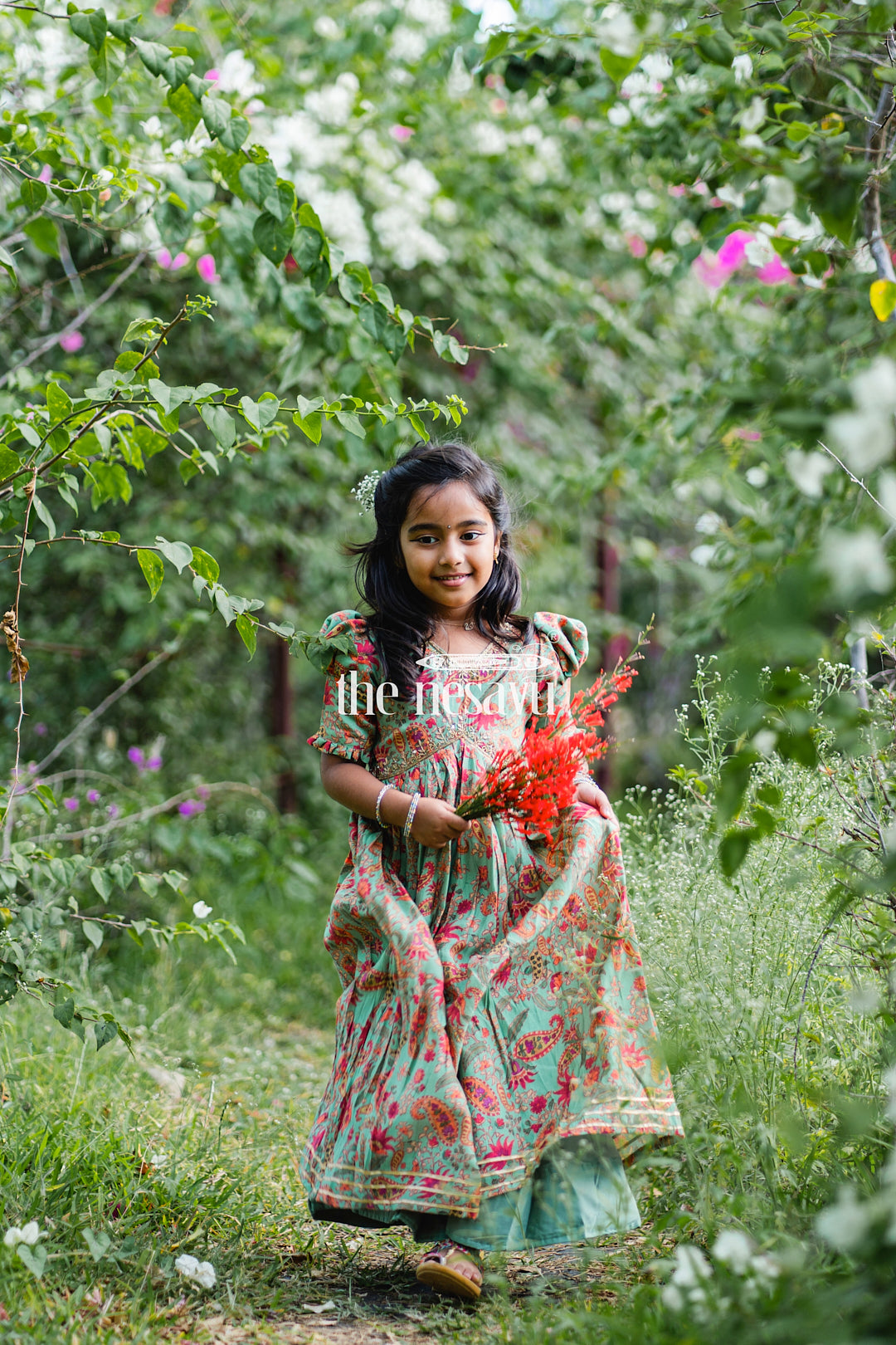 The Nesavu Girls Party Gown Beautiful Green Floral Muslin Silk Party Gown for Girls Nesavu Beautiful Green Floral Muslin Silk Party Gown for Girls - Stylish & Comfortable | The Nesavu