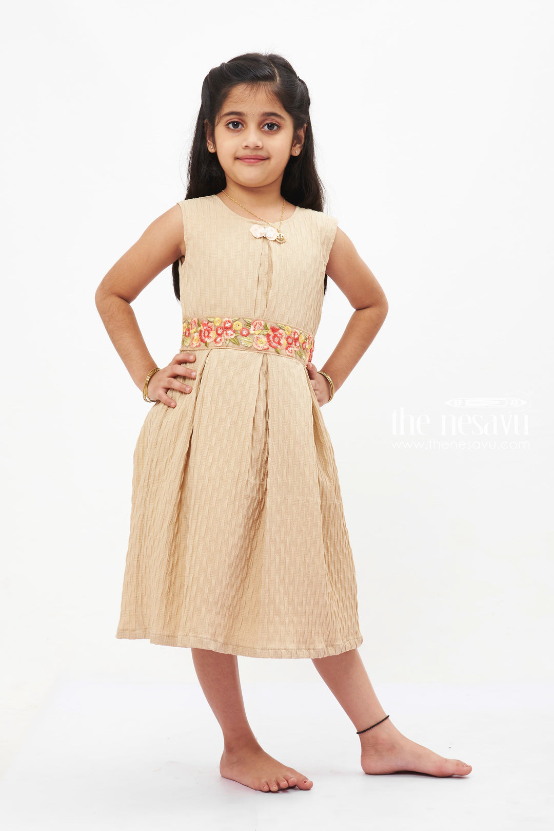 The Nesavu Girls Fancy Frock Beige Beauty Pleated Dress: Timeless Style with Charming Collar for Girls Nesavu Girls' Sleeveless Beige Pleated Cotton Dress | Elegant Collar Frock for Children | The Nesavu