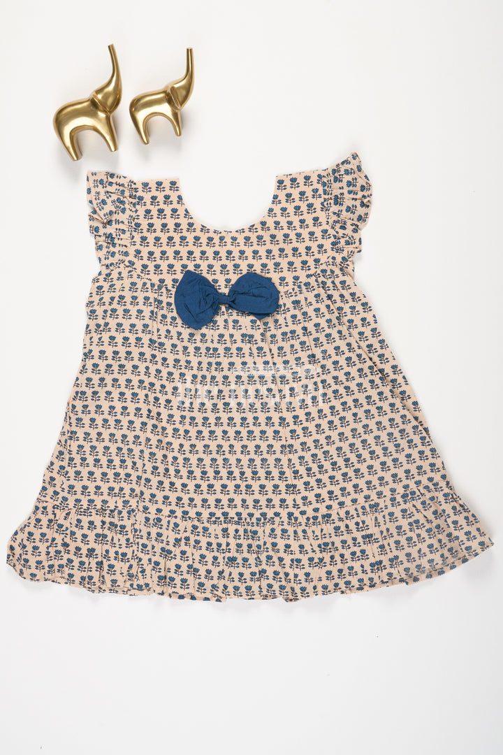 The Nesavu Baby Cotton Frocks Beige Cotton Baby Frock with Navy Blue Prints and Bow Accent Nesavu 12 (3M) / Beige BFJ615A-12 Beige Cotton Baby Frock with Navy Blue Prints and Bow Accent Nesavu