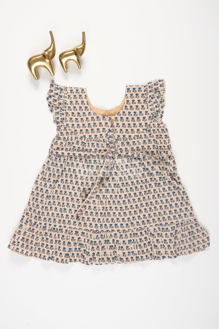 The Nesavu Baby Cotton Frocks Beige Cotton Baby Frock with Navy Blue Prints and Bow Accent Nesavu Beige Cotton Baby Frock with Navy Blue Prints and Bow Accent Nesavu