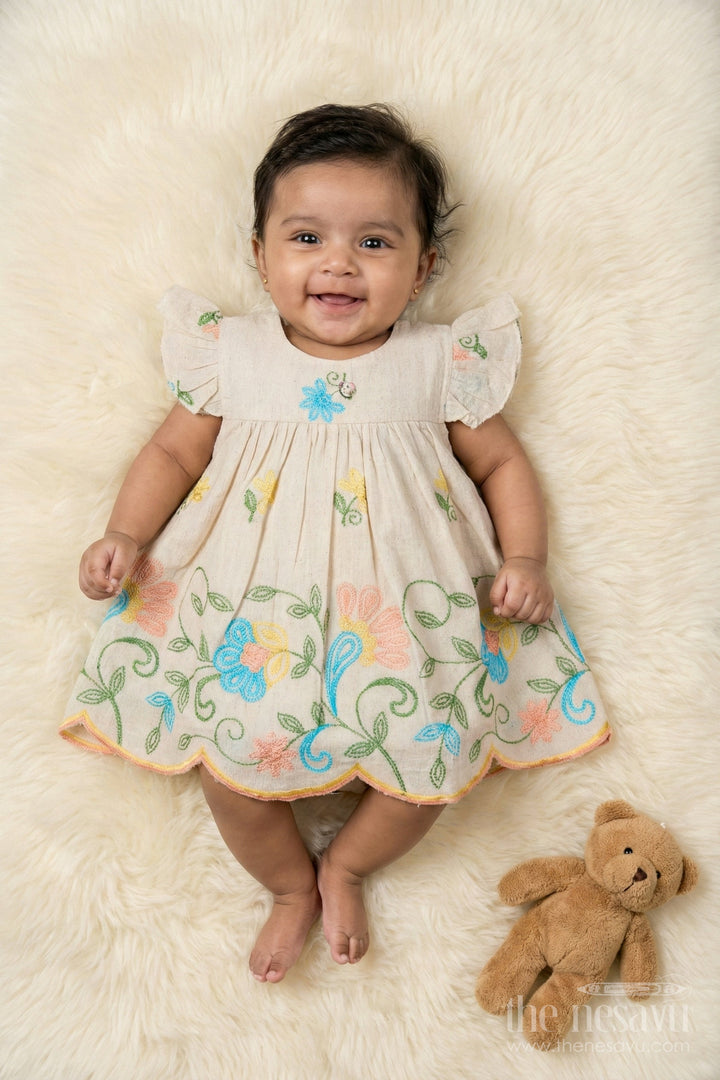 The Nesavu Baby Cotton Frocks Beige Cotton Frock with Multicolor Floral Thread Embroidery for Baby Girls Nesavu 14 (6M) / Orange BFJ902B-14 Nesavu embroidered beige cotton frock with scalloped hem for baby girls
