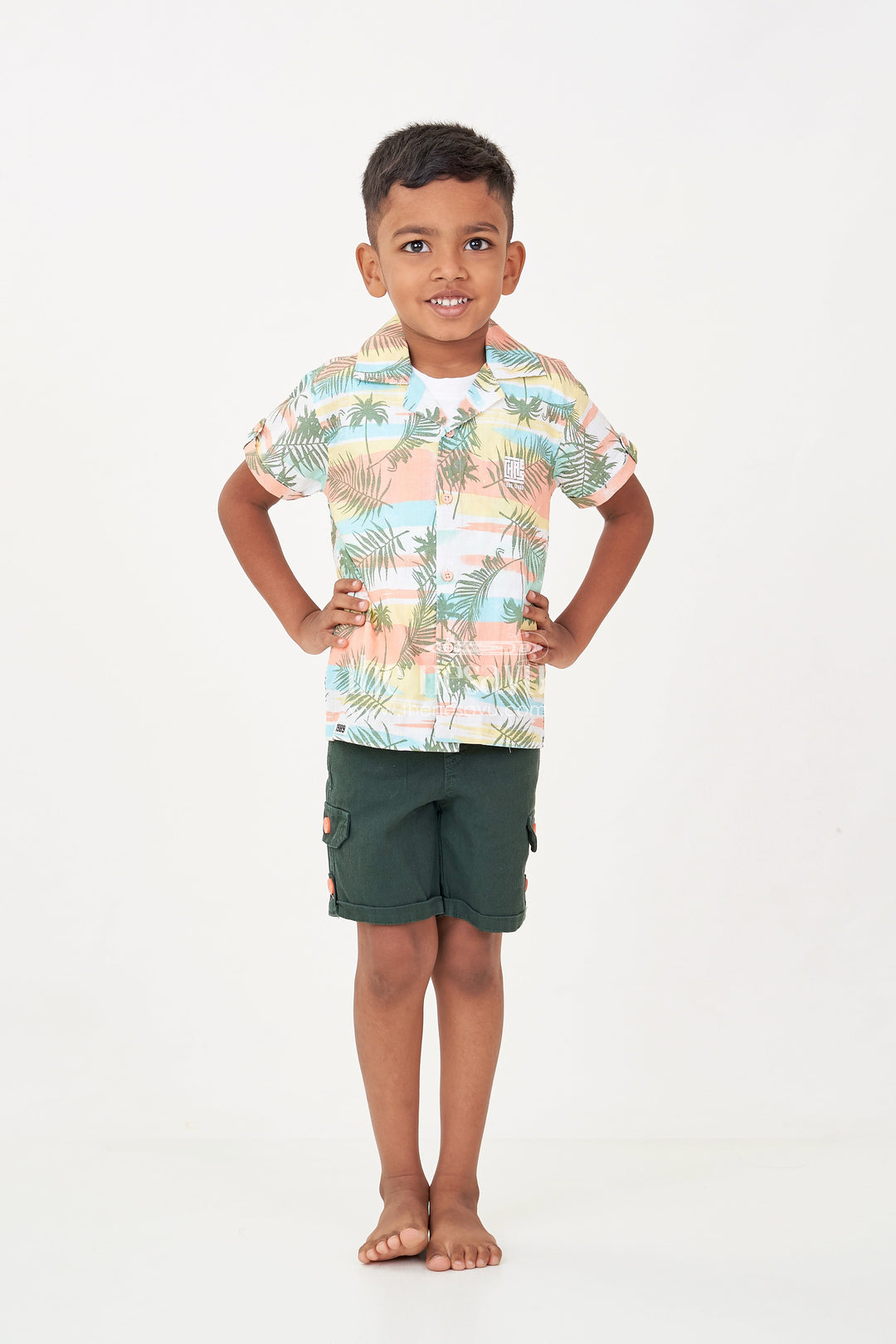 The Nesavu Boys Casual Set Best Casual Clothes Set for Boys with Tropical Printed Shirt, Sleeveless Tee, and Dark Green Shorts Nesavu Best Casual Clothes Set Boys Tropical Shirt Sleeveless Tee Green Cotton Shorts | The Nesavu