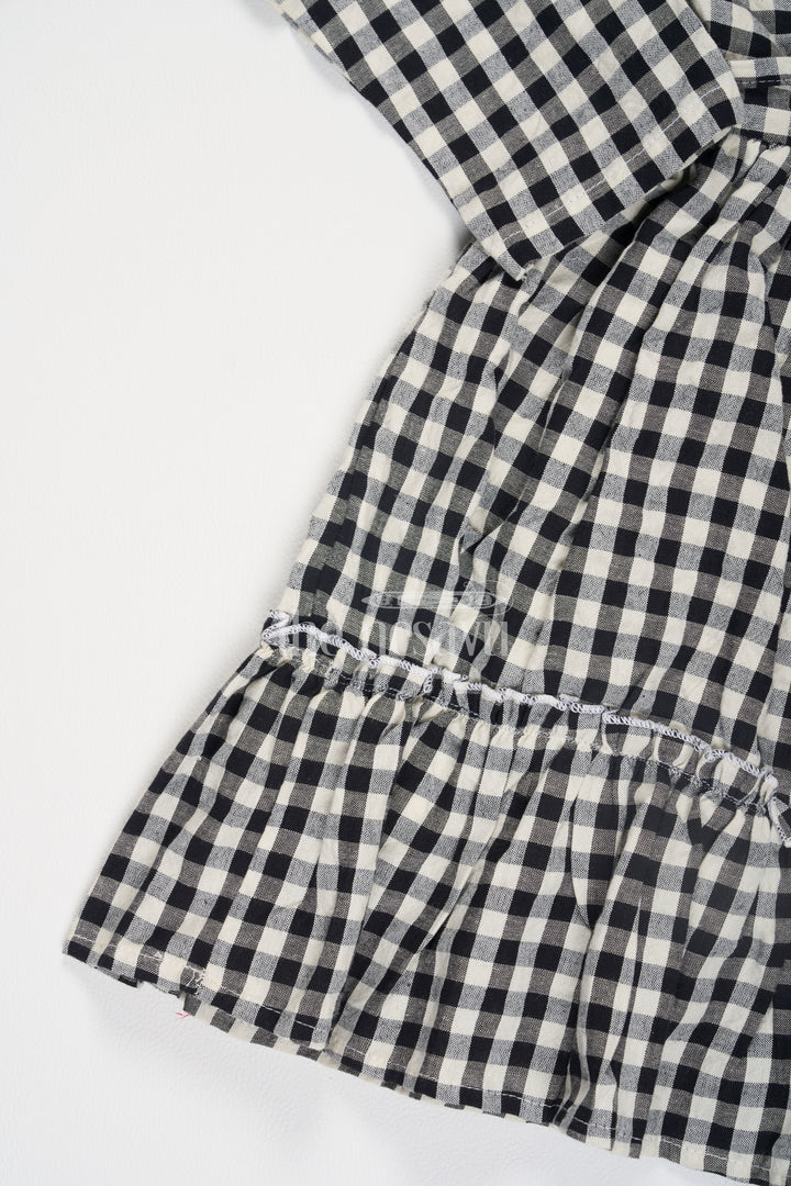 The Nesavu Girls Cotton Frock Black and White Chessboard Checked Cotton Frock with Peter Pan Collar for Girls Nesavu Black and White Chessboard Checked Cotton Frock with Peter Pan Collar for Girls Nesavu