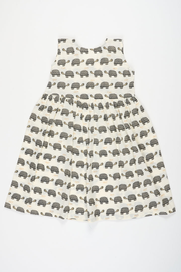 The Nesavu Baby Cotton Frocks Black and White Cotton Baby Frock with Tortoise Print Simple and Stylish Everyday Wear Nesavu Nesavu Black White Cotton Baby Frock Tortoise Print Stylish Comfortable Everyday Outfit