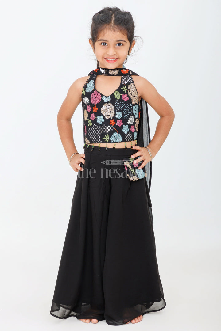 The Nesavu Girls Sharara / Plazo Set Black Halter-Neck Girls Sharara Set with Floral Embroidery and Belted Waist for Semi-Formal Occasions Nesavu 16 (1Y) / Black GPS449A-16 Nesavu Black Girls Sharara Set Floral Embroidered Halter-Neck Top Belted Skirt Special Events