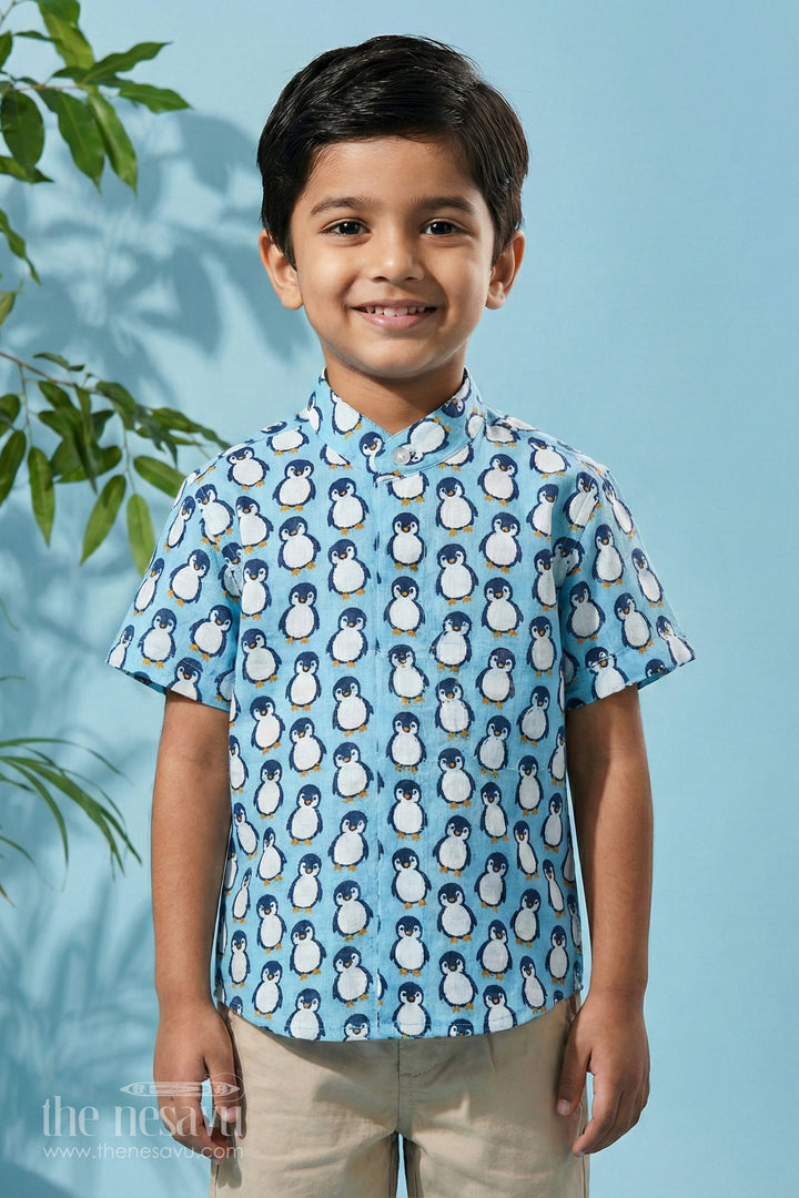 The Nesavu Boys Cotton Shirt Blue Boys Cotton Shirt with Penguin Print Half Sleeves Fun Design Easy Care Nesavu 16 (1Y) / Blue BS186A-16 Blue Penguin Print Boys Cotton Shirt Nesavu Fun Half Sleeve Design Playdates Casual Wear