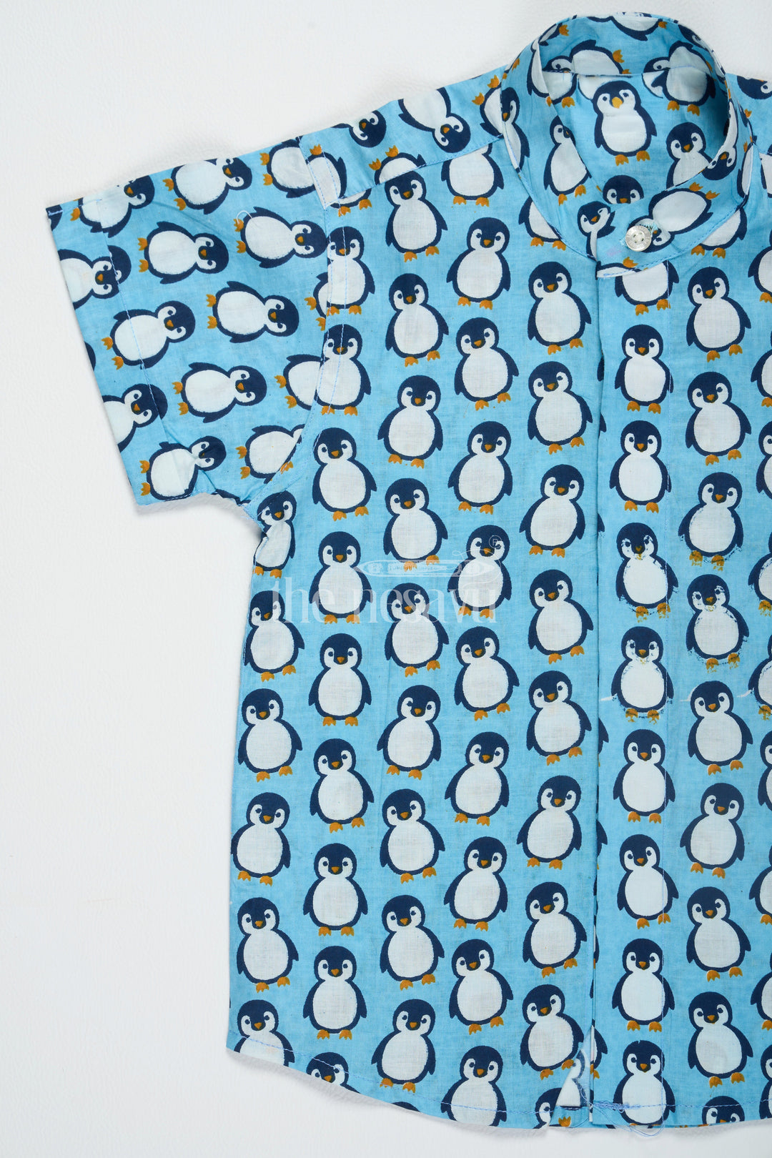 The Nesavu Boys Cotton Shirt Blue Boys Cotton Shirt with Penguin Print Half Sleeves Fun Design Easy Care Nesavu Blue Penguin Print Boys Cotton Shirt Nesavu Fun Half Sleeve Design Playdates Casual Wear