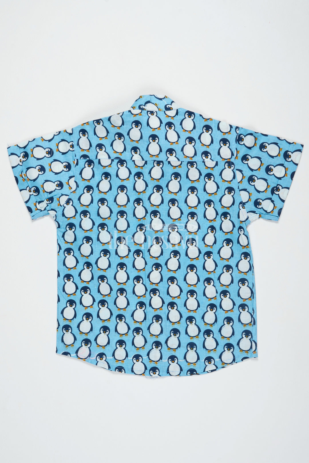 The Nesavu Boys Cotton Shirt Blue Boys Cotton Shirt with Penguin Print Half Sleeves Fun Design Easy Care Nesavu Blue Penguin Print Boys Cotton Shirt Nesavu Fun Half Sleeve Design Playdates Casual Wear