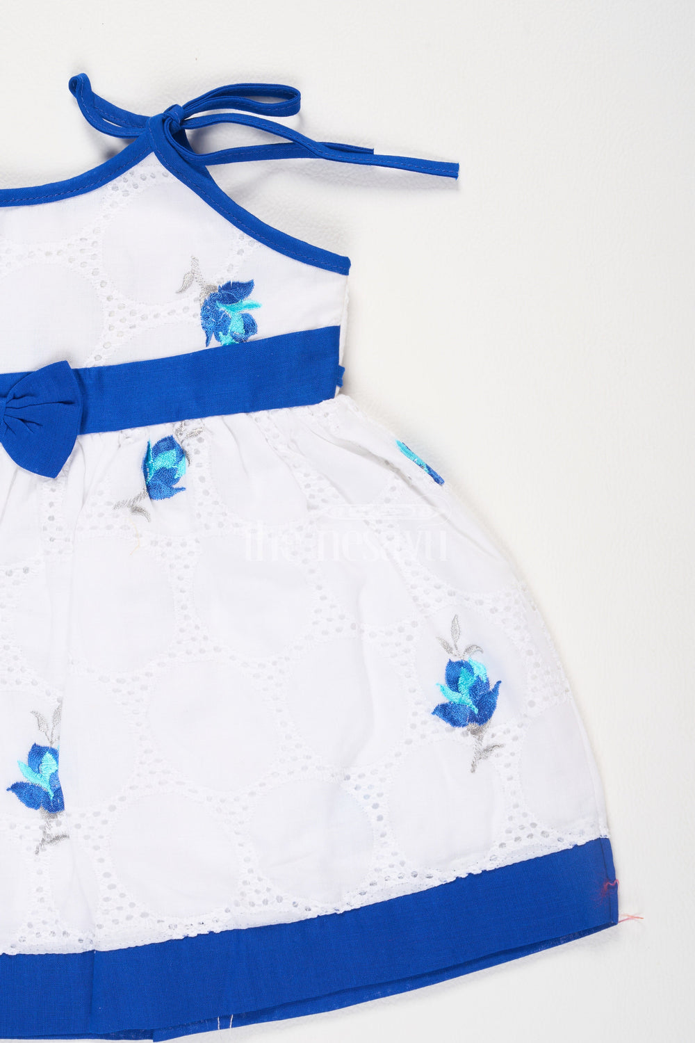 The Nesavu Tie-up Frock Blue Chikankari Embroidered TieUp Frock with Floral Motifs for Girls Nesavu Blue Chikankari Embroidered Tie-Up Frock with Floral Motifs for Girls Nesavu