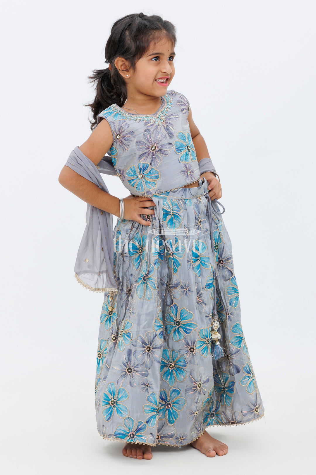 The Nesavu Girls Lehenga Choli Blue Shimmer Tissue Lehenga Choli with Floral Embroidery Nesavu Blue Shimmer Tissue Lehenga Choli with Floral Embroidery - Nesavu