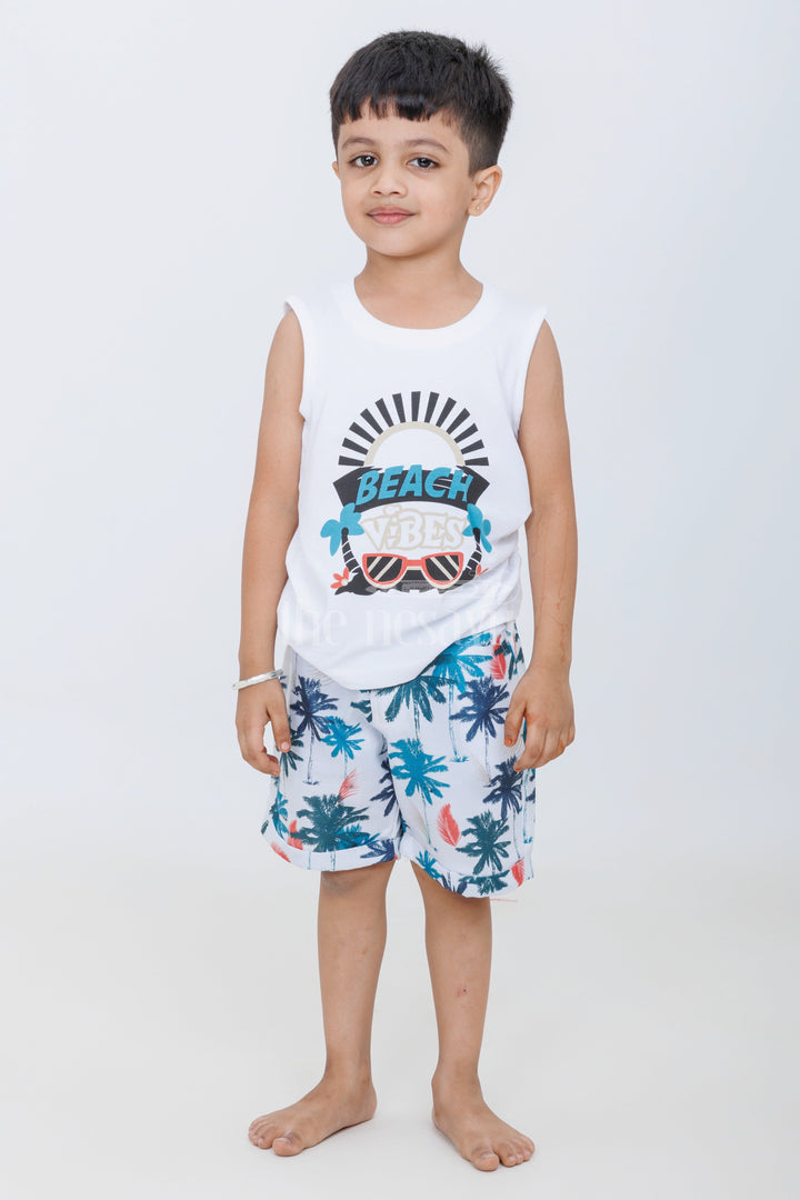 The Nesavu Boys Casual Set Boys Beach-Themed Palm Tree Print Casual Set in Blue and Pink with Graphic Shirt Nesavu Nesavu Boys Beach-Themed Casual Set Palm Tree Print Graphic Shirt Shorts Summer Outings