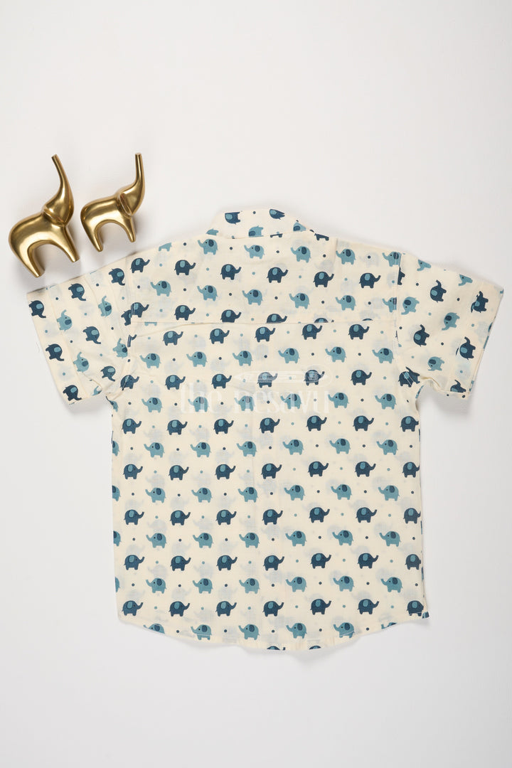 The Nesavu Boys Cotton Shirt Boys Beige Cotton Shirt with Playful Blue Elephant Print for Fun Casual Wear Nesavu Nesavu Boys Beige Cotton Shirt Blue Elephant Print Short Sleeves Everyday Fun