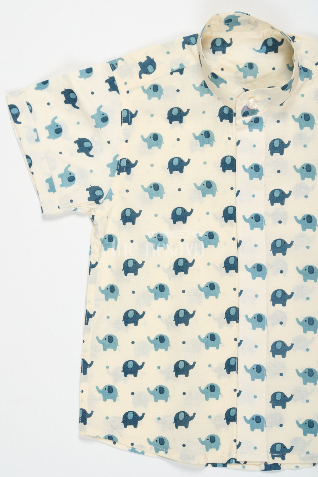 The Nesavu Boys Cotton Shirt Boys Beige Cotton Shirt with Playful Blue Elephant Print for Fun Casual Wear Nesavu Nesavu Boys Beige Cotton Shirt Blue Elephant Print Short Sleeves Everyday Fun