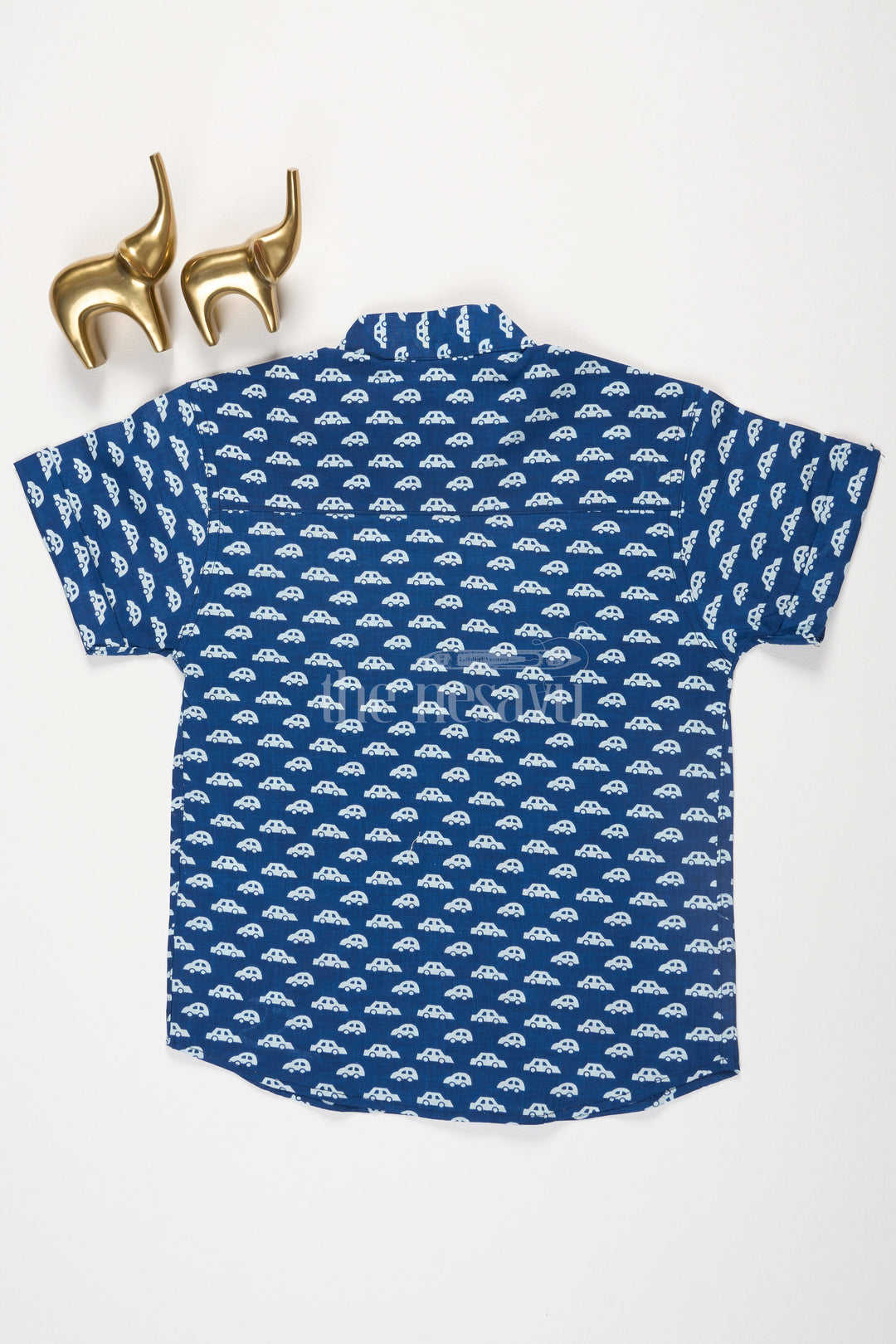 The Nesavu Boys Cotton Shirt Boys Blue Cotton Shirt with Bold White Car Print for Casual Formal Outings Nesavu Nesavu Boys Blue Cotton Shirt White Car Print Short Sleeves Playful Casual Wear