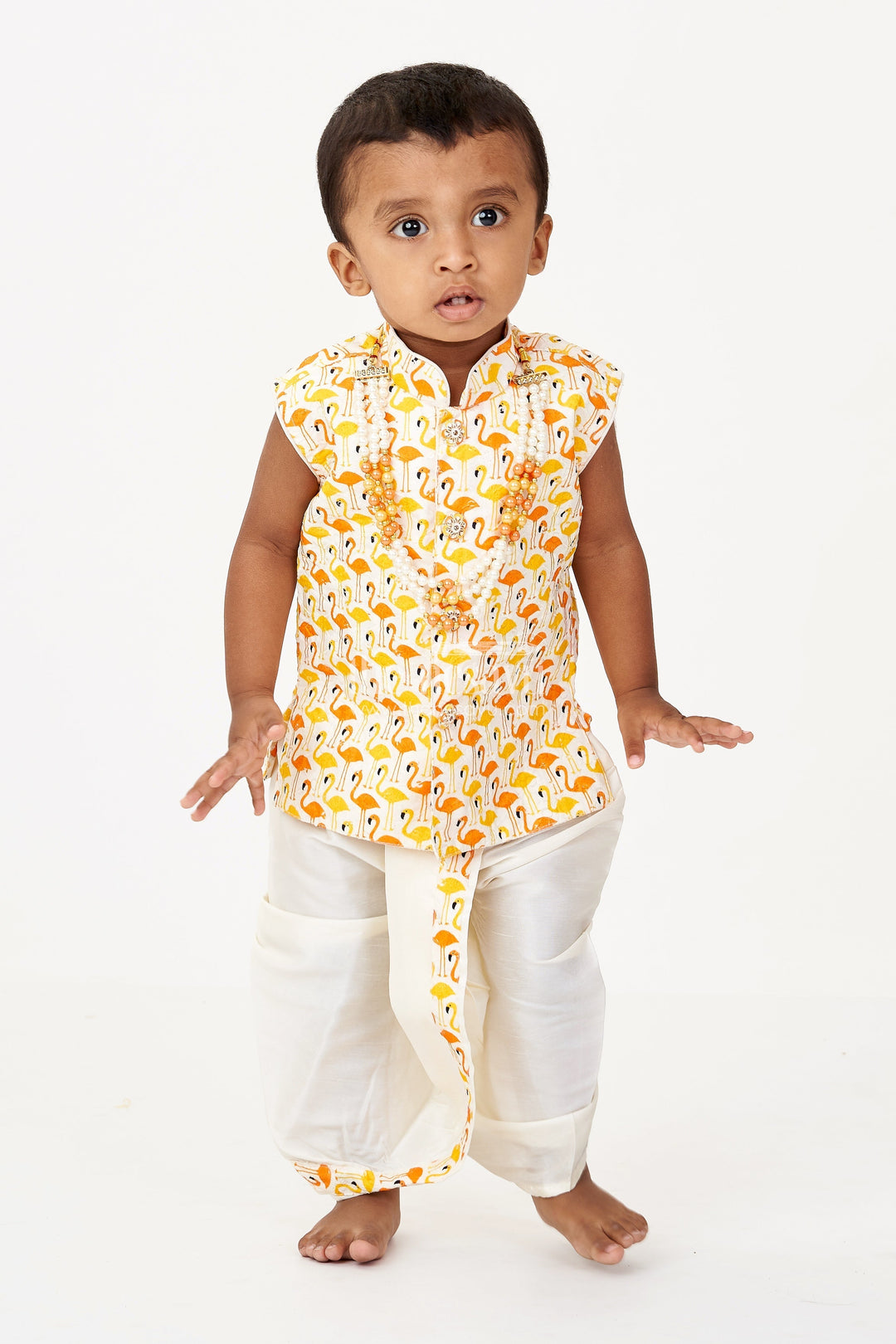 The Nesavu Boys Dothi Set Boys Cotton Dhoti Pant Set with Yellow and Orange Flamingo Print Jacket in Cotton Blend Nesavu 12 (3M) / Yellow BES684A-12 Boys Cotton Dhoti Pant Set Flamingo Printed Sleeveless Jacket Cream Bottom | The Nesavu