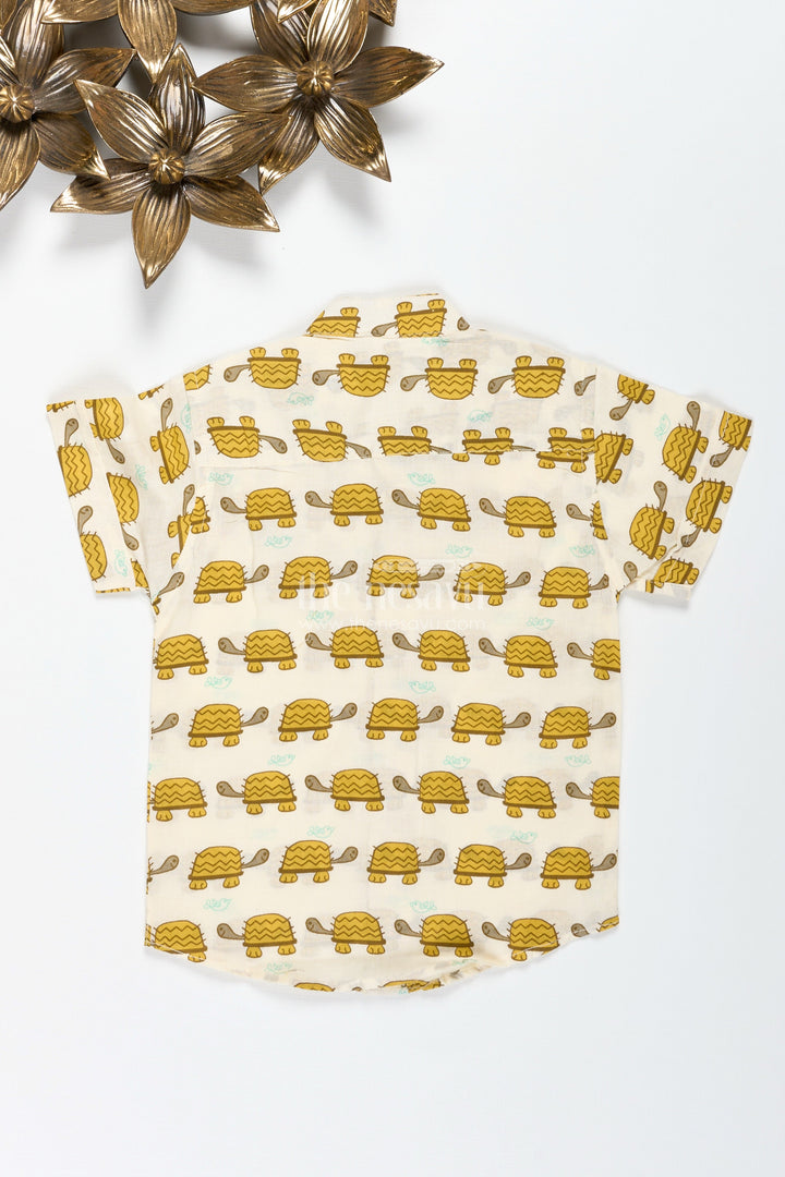 The Nesavu Boys Cotton Shirt Boys Cotton Shirt with Mustard Turtle Print for Ethnic Gatherings Nesavu Nesavu Boys Cotton Shirt Mustard Turtle Print Fun Ethnic Wear Kids