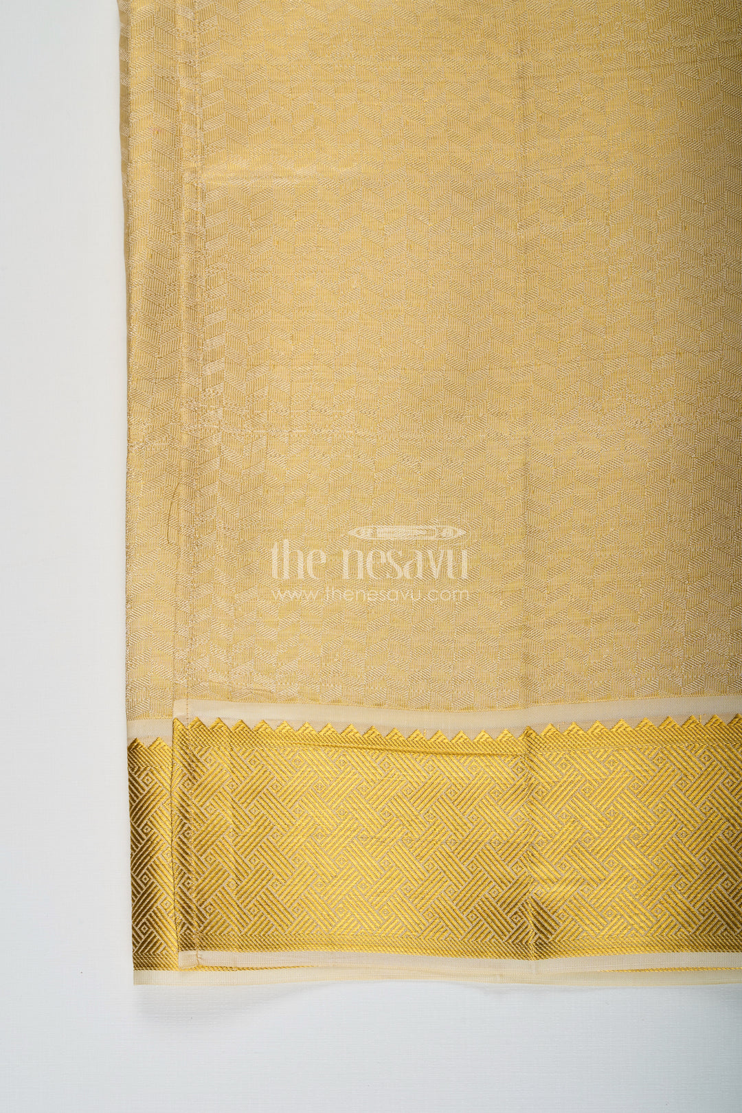 The Nesavu Boys Vesti Boys Golden Embossed Tissue Dhoti with Classic Patterned Border for Spiritual Wear in Dhoti for Puja Style Nesavu Boys Dhoti Puja Golden Embossed Tissue Traditional Zari Pattern Ritual Wear | The Nesavu
