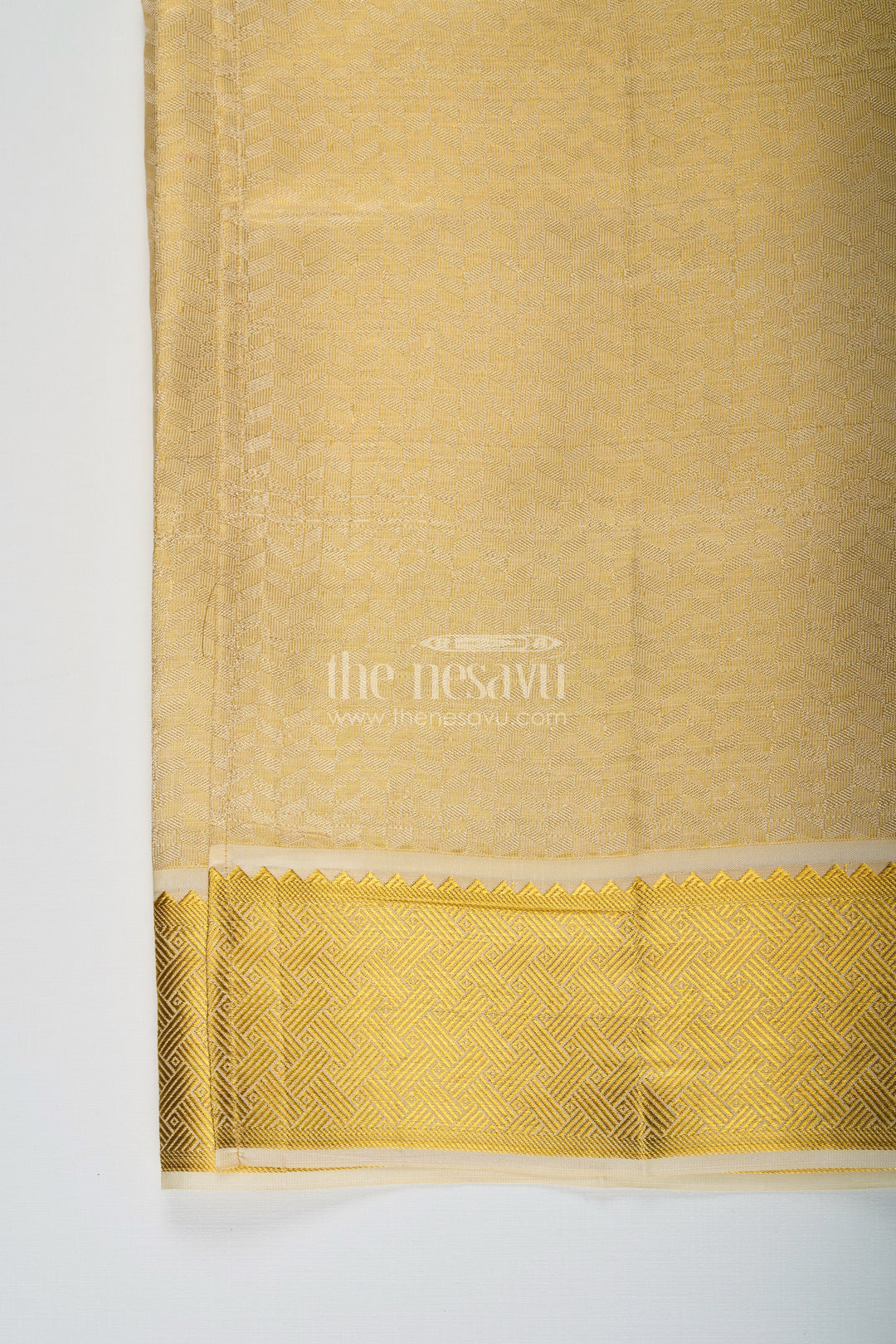 The Nesavu Boys Vesti Boys Golden Embossed Tissue Dhoti with Classic Patterned Border for Spiritual Wear in Dhoti for Puja Style Nesavu Boys Dhoti Puja Golden Embossed Tissue Traditional Zari Pattern Ritual Wear | The Nesavu