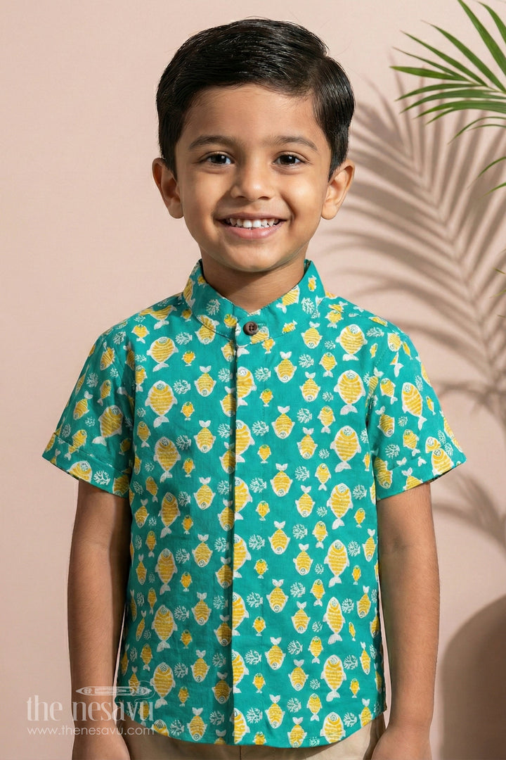 The Nesavu Boys Cotton Shirt Boys Green Cotton Shirt with Fun Yellow Fish Print for Everyday Wear Nesavu 16 (1Y) / Green BS166B-16 Nesavu Boys Green Cotton Shirt Playful Yellow Fish Print Casual Summer Wear